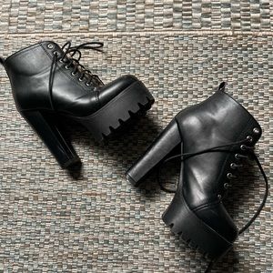 Chunky Platform Boots Featuring Lace Up Grommets
